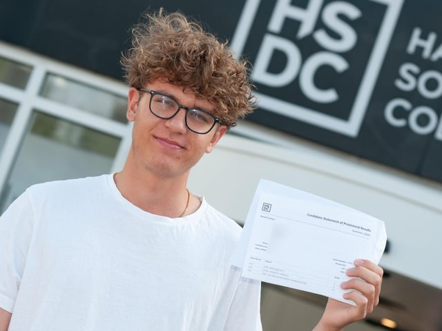 Ben Labedz collects his results at Havant and South Downs College. Picture: Duncan Shepherd