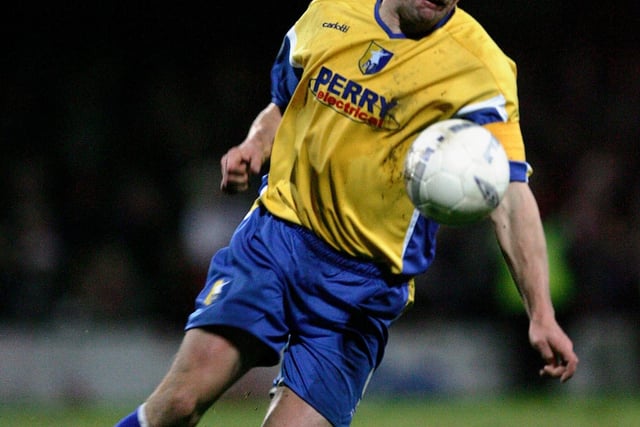 Richie Barker drives forward for Stags.