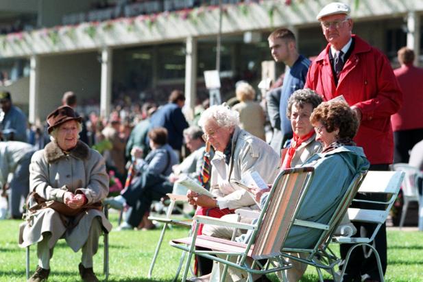 Race goers enjoy the last of the Summer sun at the 1997 races.
