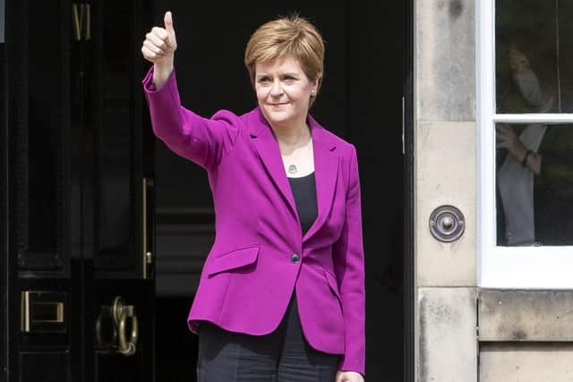 Scottish First Minister and SNP leader Nicola Sturgeon on the steps outside Bute House in Edinburgh. Photo: Jane Barlow/PA Wire
