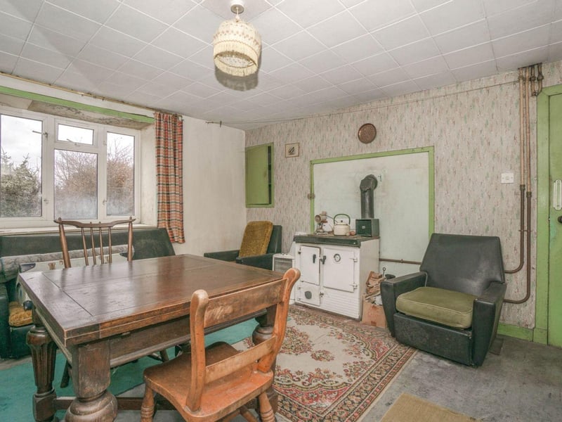 On the market for offers over £180,000, this two-bed detached house is found in Bonar Bridge in the Highlands. It has great potential and comes with outbuildings and approximately nine hectares of croft land too.