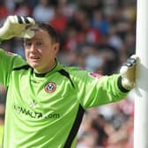 Sheffield United goalkeeper Paddy Kenny in action as he makes his return after a nine month suspension against Swansea City: Anna Gowthorpe/PA Wire