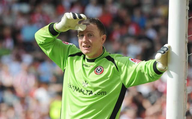 Sheffield United goalkeeper Paddy Kenny in action as he makes his return after a nine month suspension against Swansea City: Anna Gowthorpe/PA Wire