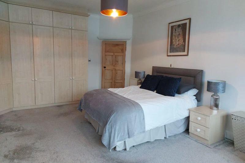 This spacious double bedroom enjoys superb views over Savile Park. There are built-in wardrobe facilities with cupboard space above to two walls.