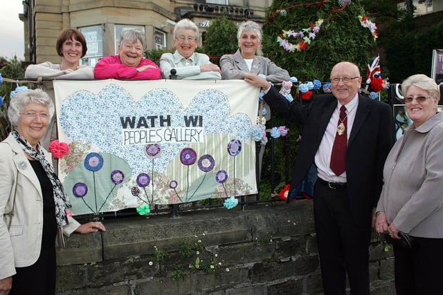 Janet Bailey, Susan Blease, Ingrid House, Jean Young, Wendy walker from Wath WI with Cllr John Forden and Kath Forden at the launch of the kitted items which decorated Wath in 2012