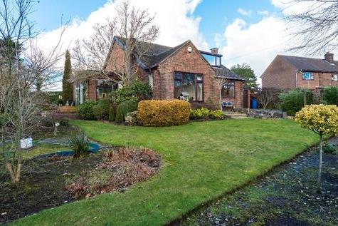 This five-bedroom bungalow is on the market for £350,000 with Belvoir.