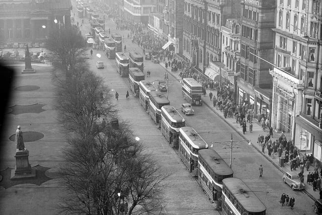A queue of trams on Princes Street, after an overhead bracing broke at the Mound in November 1952. Engineers had the trams moving again within 40 minutes.