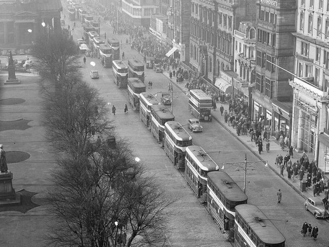 A queue of trams on Princes Street, after an overhead bracing broke at the Mound in November 1952. Engineers had the trams moving again within 40 minutes.