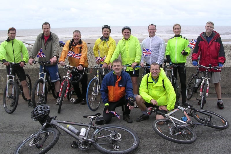 Kevin Churn, Paul Oakland, Ian West, Alan Roberts, Kev Bingham, Sean Quigley, Lucy Shakespeare and Nick Roe with Robbie Hague and Andrew Nunn (front)  who completed an 83-mile sponsored bike ride from Chesterfield to the coast for the Parkinson's Disease Society.