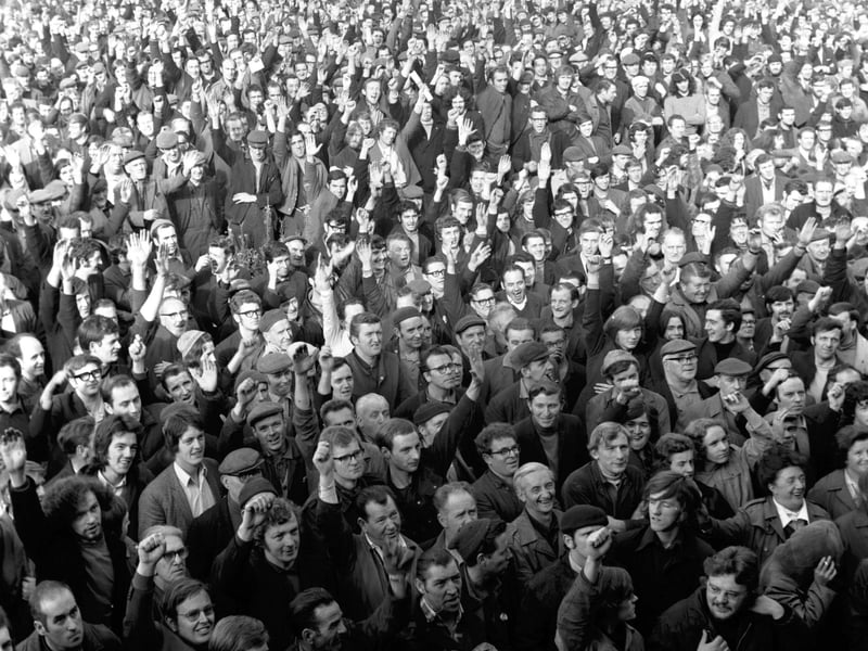Upper Clyde Shipbuilders workers demonstrate their support of the UCS shop stewards with a show of hands at a mass meeting in Govan shipyard Glasgow in September 1971.