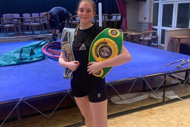 Title winner Ellie Coulson, of the Boyles Pro Boxing stable poses with her title belt.