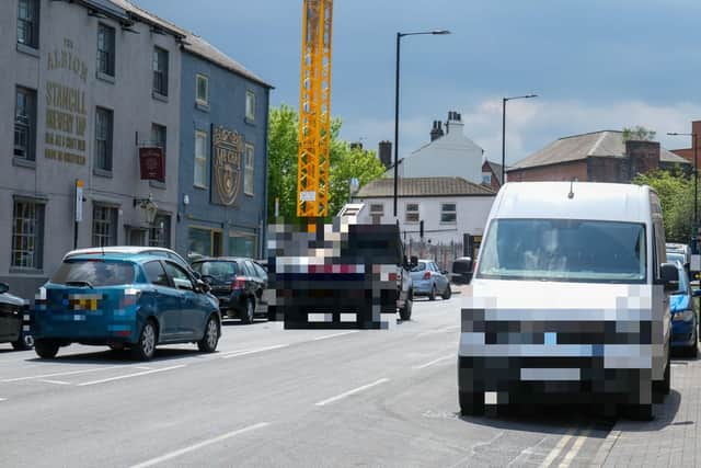 London Road. There is no suggestion that any of the vehicles in the image are badly parked. The picture is for illustrative purposes only.