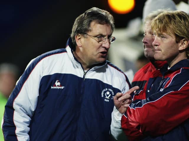 Sheffield United manager Neil Warnock talks with his assistant Stuart McCall (Ian Walton/Getty Images)