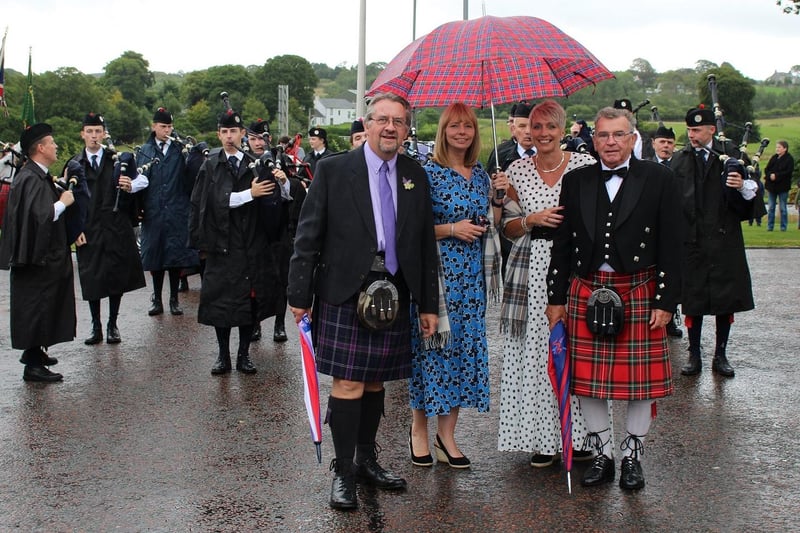 The rain didn’t stop the fun for Highland Games chairman David Abercrombie, Walter Paterson and his daughters Gail Martin (left) and Liz Steele.
