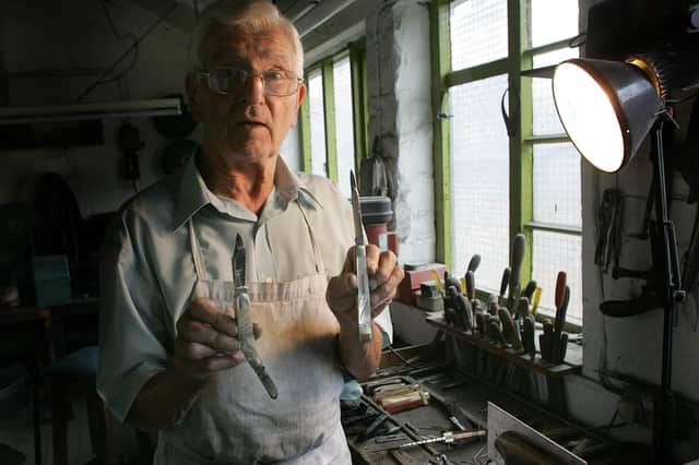 Little Mester Stan Shaw with some of his knifes, August 2006