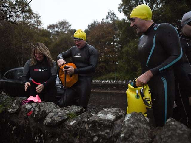 Open water swimming enthusiasts enjoy an early morning swim in Loch Lomond , Trossachs, Scotland. A new study from the UK Dementia Research Institute found that the blood of regular winter swimmers contains a "cold-shock" protein that wasn't found in that of people who did other cold-weather exercise on dry land. This protein has elsewhere been shown to slow the onset of dementia and even repair damage it causes in mice.