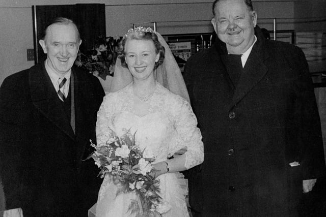 Famous comedy duo Laurel and Hardy with a bride at the former Sheffield Grand Hotel in March 1954