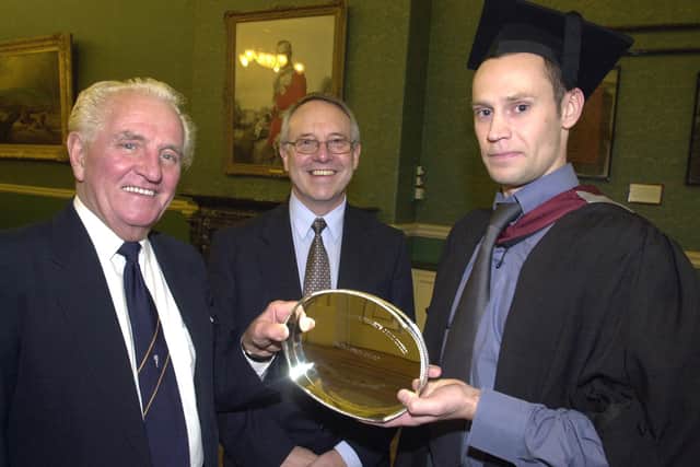 SHOP STEWARDS AWARD  Right, Sheffield Hallam graduate Steven Whysall(33) is presented  with the Firth Brown Shop Stewards Award by Jack Illingworth(left), former chairman of Shop Stewards. Looking on is David Eaton, Director of School of Engineering. Pictured at the Cutlers Hall.         November 21 2001