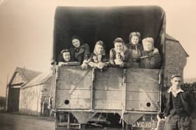 Hilda Wyatt (far right) and other land girls