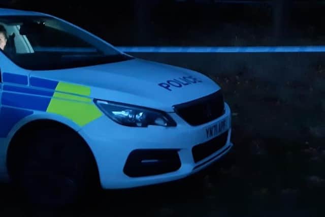 A delivery man is in hospital after being stabbed in the early hours of this morning in Sheffield city centre. File picture shows a police car at a police incident in Sheffield