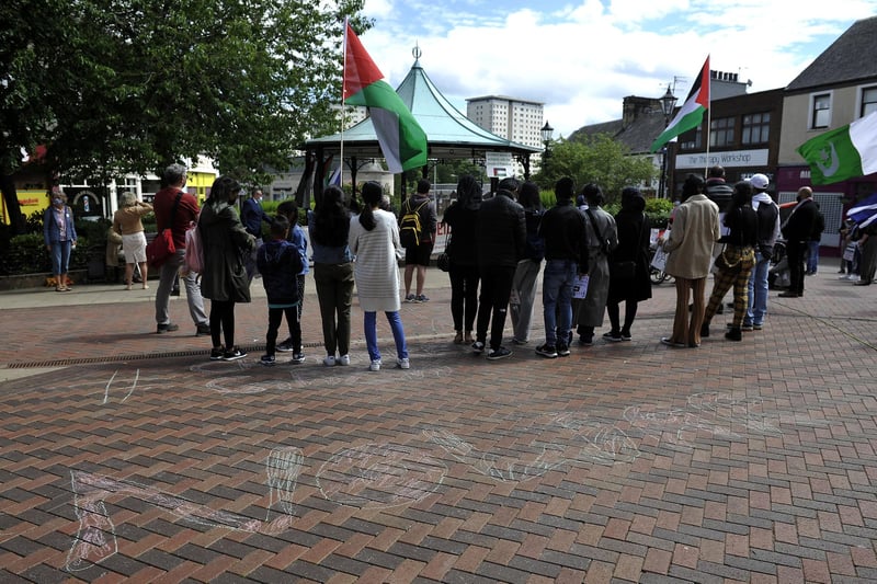 A crowd gathered to listen to speeches delivered from the bandstands in Falkirk town centre as part of the Palestine peace rally held on Saturday. Picture: Michael Gillen