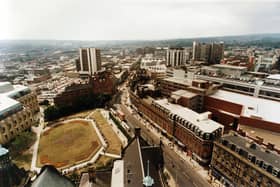 An overhead view of the old-style Peace Gardens and Pinstone Street, Sheffield in August 1995 - the fountains are near the spot where the little tree stands in the bottom left-hand corner and the Winter Gardens/Millennium Gallery would replace part of the 'eggbox' Town Hall extension