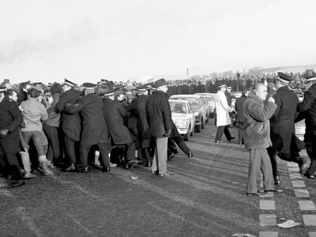 Police clash with pickets and miners outside Longannet power station.