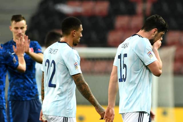 Scotland's Scott McKenna (right) and Liam Palmer appear dejected after the final whistle during the UEFA Nations League Group 2, League B match at City Arena, Trnava, Slovakia. PA Photo.  Martin Baumann/TASR/PA Wire.