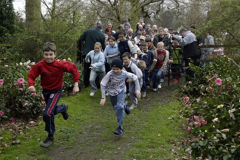 The race is on to find the Easter egg tokens in the grounds of Renishaw Hall in 2004. Are you on the photo?
