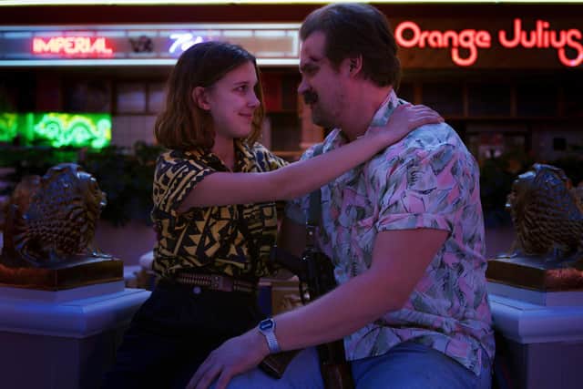Eleven (Millie Bobby Brown) with her father figure, Hopper (David Harbour) in Stranger Things season three.