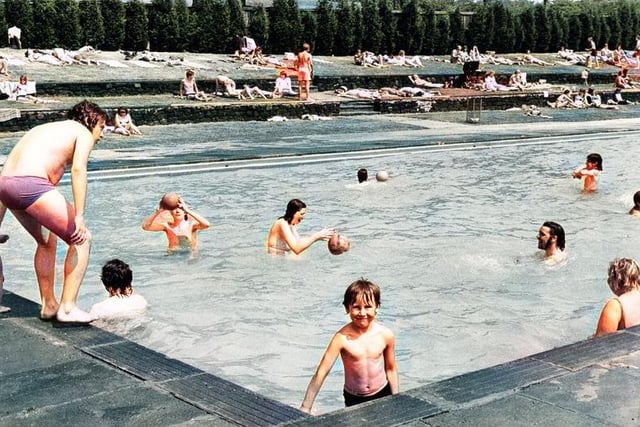 Swimmers and sun bathers at Longley Swimming Pool, Sheffield, which was reopened to the public on June 12, 1975. Picture: Sheffield Newspapers