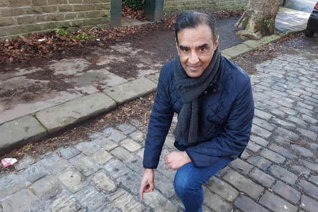 Western Road, Crookes, has seen its surface changed back into cobbles. More Sheffield Streets could follow. Pictured is Coun Mohammed Mahroof