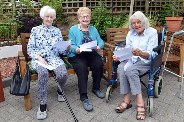 Residents Jean Norris, Anne Curbishley and Jannice Rolton at Twelves Trees care home with letters of support they received from Year 4 children at Carterknowle Primary