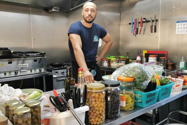 Chef Aslan at work in Zaatar's Middle Eastern cafe in Abbeydale Road, Sheffield
