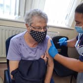 A patient receives her Covid autumn booster jab at Firth Park Surgery,  Sheffield. Vaccinations are underway across the city this week