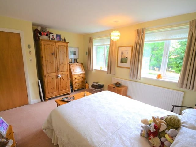 Bedroom 2 - A large double bedroom which also enjoys a pleasant view from two front facing UPVC double glazed windows, having various power sockets, central heating radiator and plenty of space for bedroom furniture.