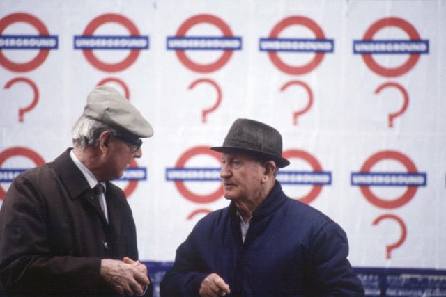 Two men chatting in a Strathclyde Transport underground station in Glasgow,  August 1990.