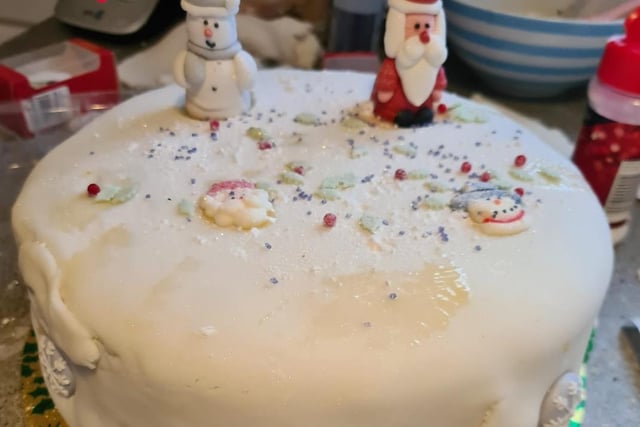We love these cute Christmas cake toppers in Julie's cake.