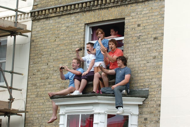 Fans at every vantage point to celebrate Pompey winning the FA Cup. Picture: Malcolm Wells 082235-172