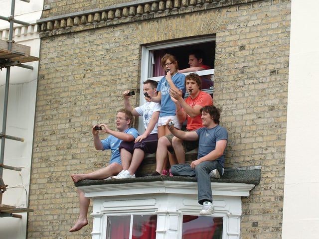 Fans at every vantage point to celebrate Pompey winning the FA Cup. Picture: Malcolm Wells 082235-172