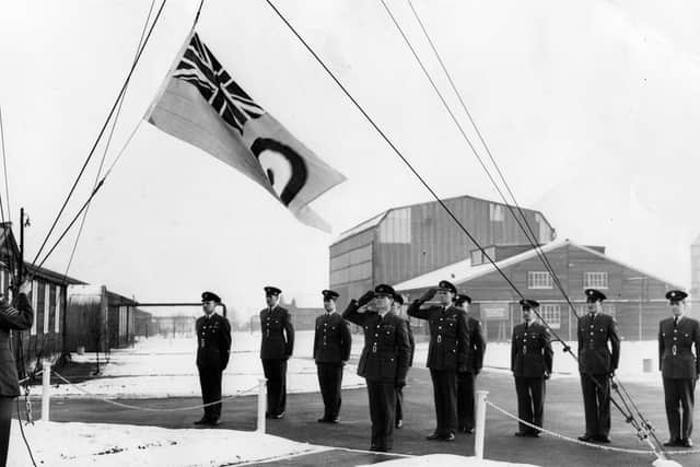 Saluting the flag, lowered for the last time at RAF Norton in 1965
