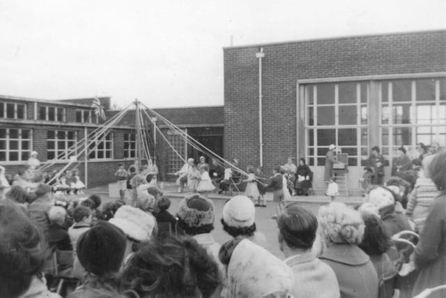 It's Commonwealth Day in 1962 and here are the infants showing their Maypole dancing skills at Golden Flatts School.