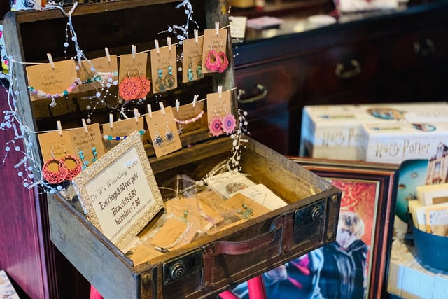 Here's a display of 'Dr W's Wizarding Wares', including earrings, bracelets and necklaces for sale.
