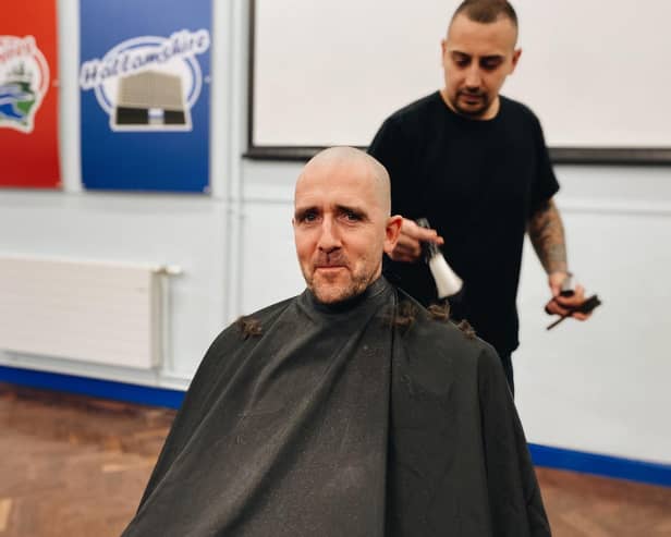 Hallam Primary School headteacher Chris Stewart had his head shaved to raise money for Sheffield Children's Hospital and to support one of his pupils who is currently going treatment for brain tumour. Picture by Hallam Primary School.