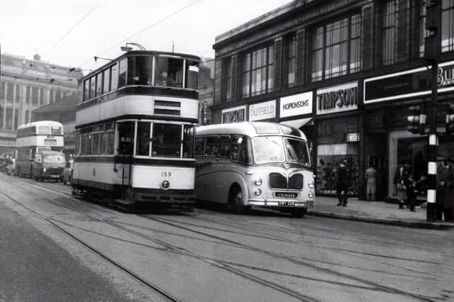 Trams run along Attercliffe Road, Sheffield, in the 1950s