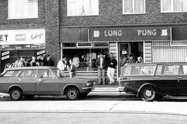 Pupils of Yewlands School taking their lunch break outside Lung Fung Chinese takeaway on Chaucer Road in Parson Cross, Sheffield, in 1989