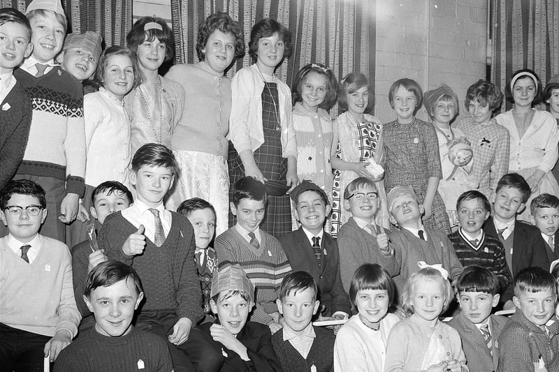 Christmas party time in 1964 - lots of happy faces here, can you spot anyone you know?