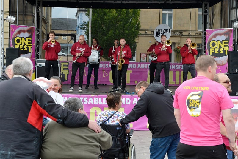 Live music on the OneFest stage from Back Chat Brass.