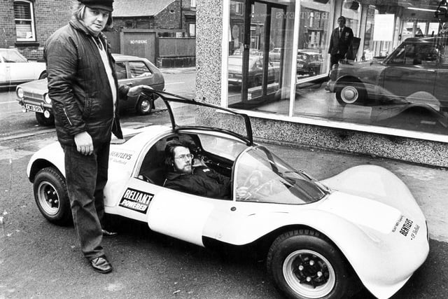Our picture shows a racing car designed and built in Sheffield.  On the left is Tony Shaw, an assistant parts manager at a Sheffield garage, and Martin Reed, a draughtsman with a city firm.  These two, in conjunction with Trevor Hegarty, designed and built the car which will run in its first race in March 1975.  Photo February 26, 1975