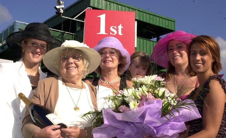 These ladies got free tickets to the St Leger in 2002 - they even got a mention on the Ladies Day card.